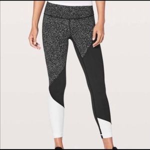 Lululemon Wunder Under polka dot white and black color block leggings.